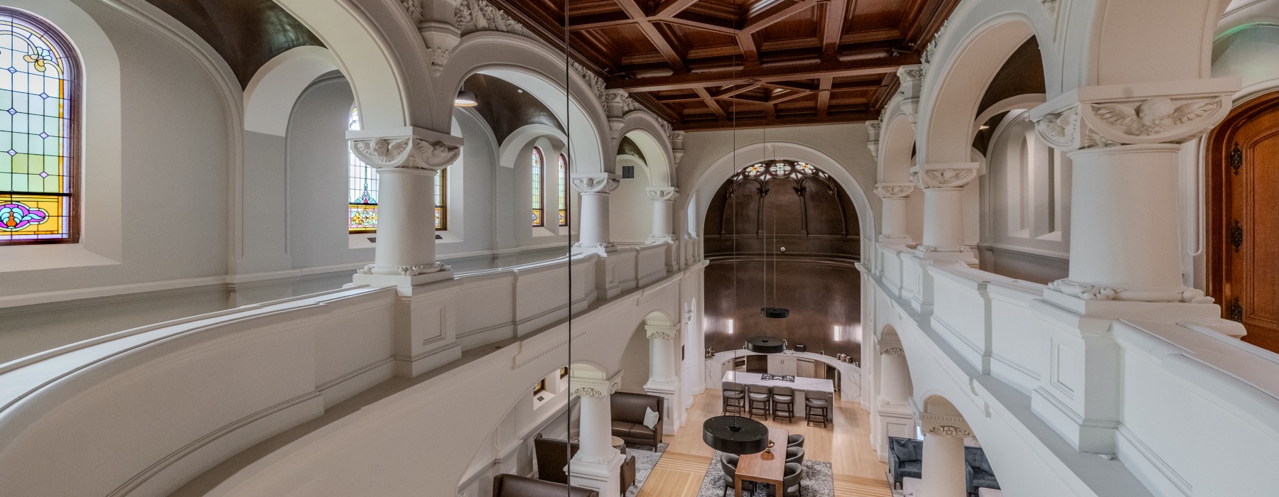 a large room with a large table and chairs