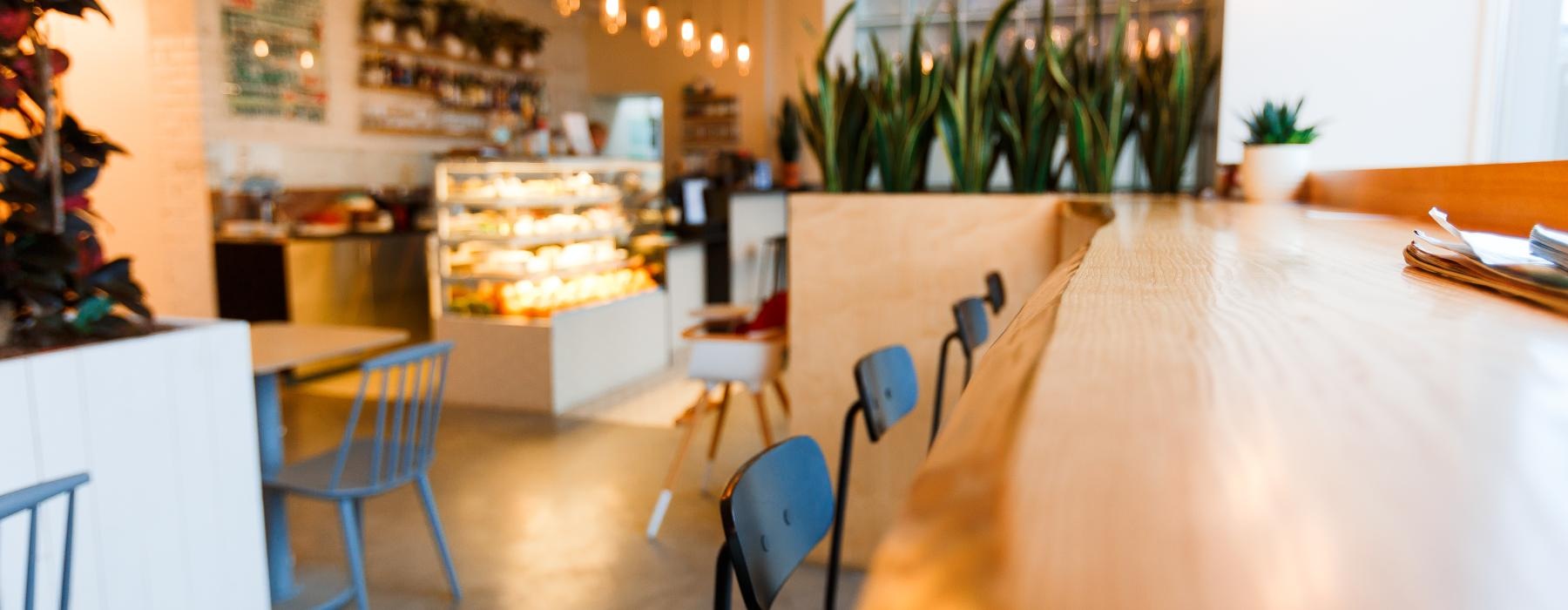 a restaurant with tables and chairs